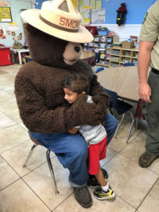 Smokey the Bear teaches forest fire prevention at EduCare Academy