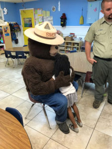 Smokey the Bear teaches forest fire prevention at EduCare Academy