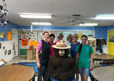 Smokey the Bear teaches forest fire prevention at EduCare Academy