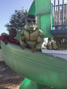 Children dressed up in costumes on October 31, to celebrate Super Hero day.